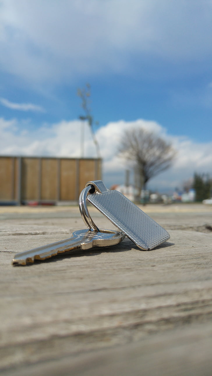 key, keychain, metal, wood