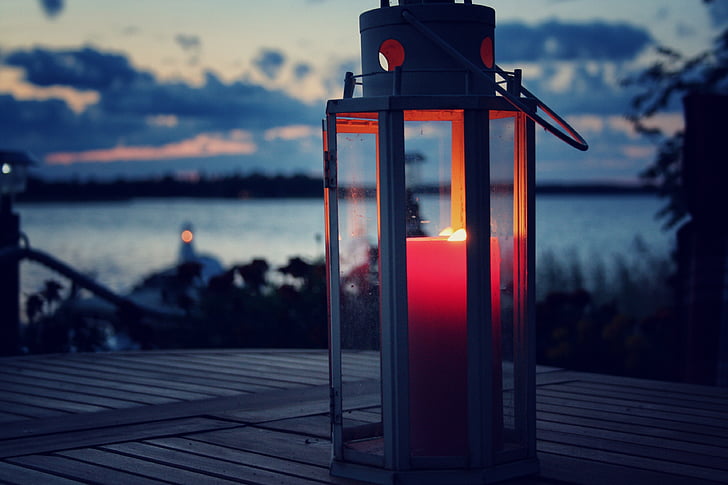 candle light, stearinlys, lanterne, diset, havet, skyer, aften