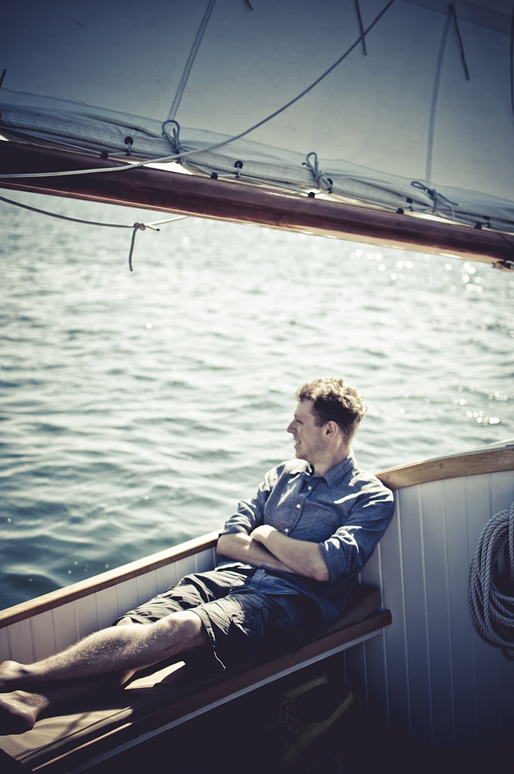 sailboat, boating, lake, water, guy, man, shorts