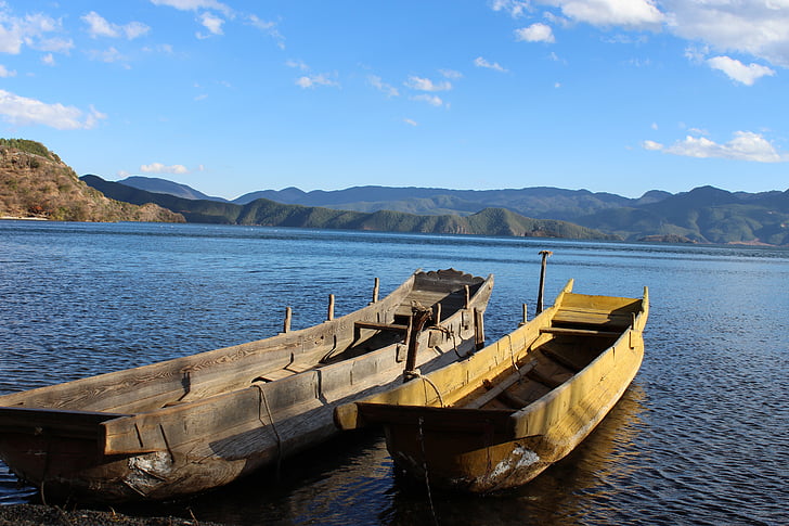 boats couple, lugu lake, the scenery