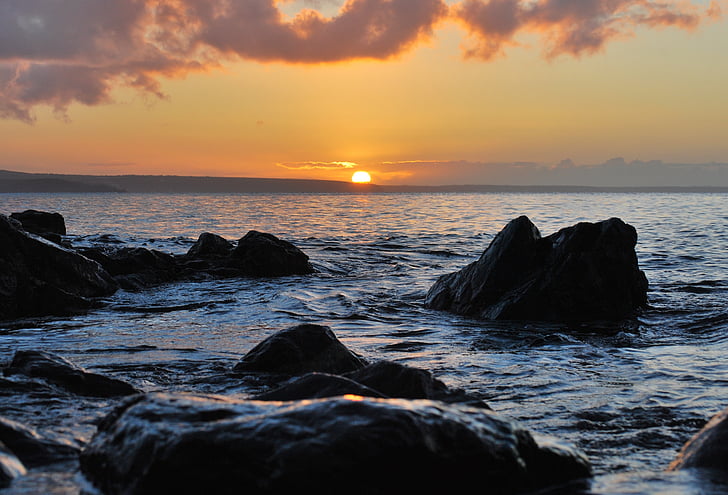 sunset, dusk, ocean, sea, rocks, boulders, clouds