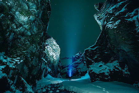 ice, cave, rocks, snow, winter, flashlights, people