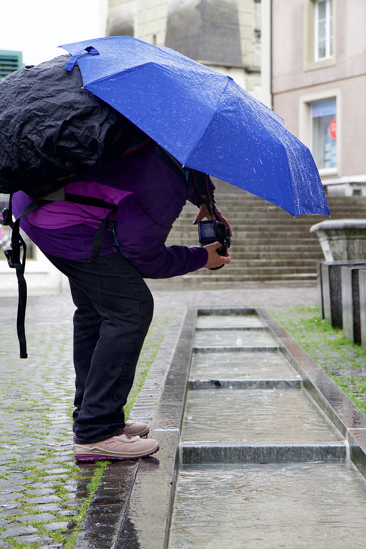 photographer, umbrella, water, wet