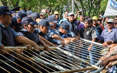 fences, police, workers, protest