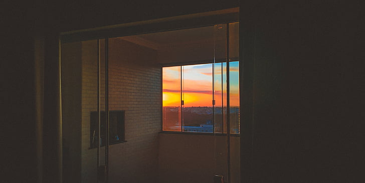 bricks, wall, glass, window, sunset, sky, clouds