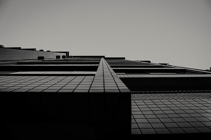 architecture, black-and-white, building, low angle shot, perspective, sky, skyscraper