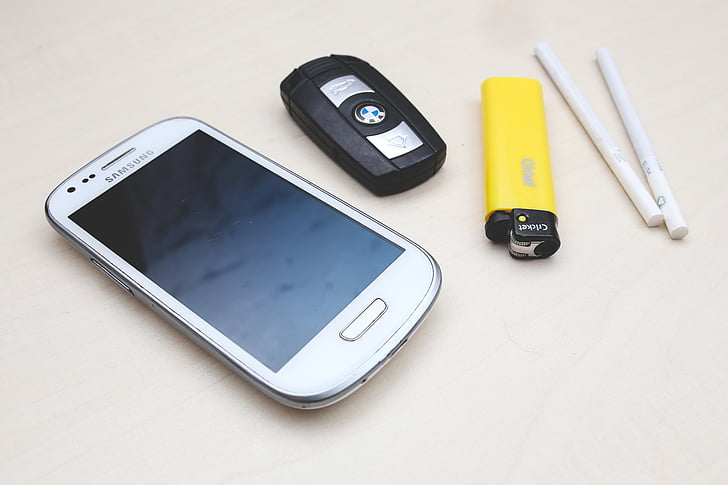 phone, mobile, smartphone, screen, car key, lighter, cigarettes