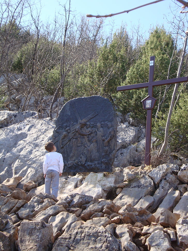 stations of the cross, cross, kid, cliff, rocks, child, pilgrim