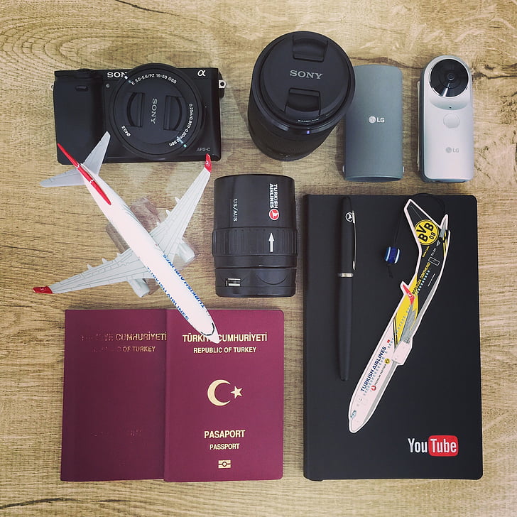 assorted, products, lot, airplane, business, camera, passport