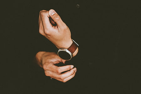 hands, person, watch, wristwatch, human body part, black background, human hand