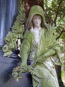 sorg, Kvinnlig staty, kyrkogården