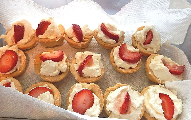 strawberry tarts, whipped cream, fresh fruit, pastry shells