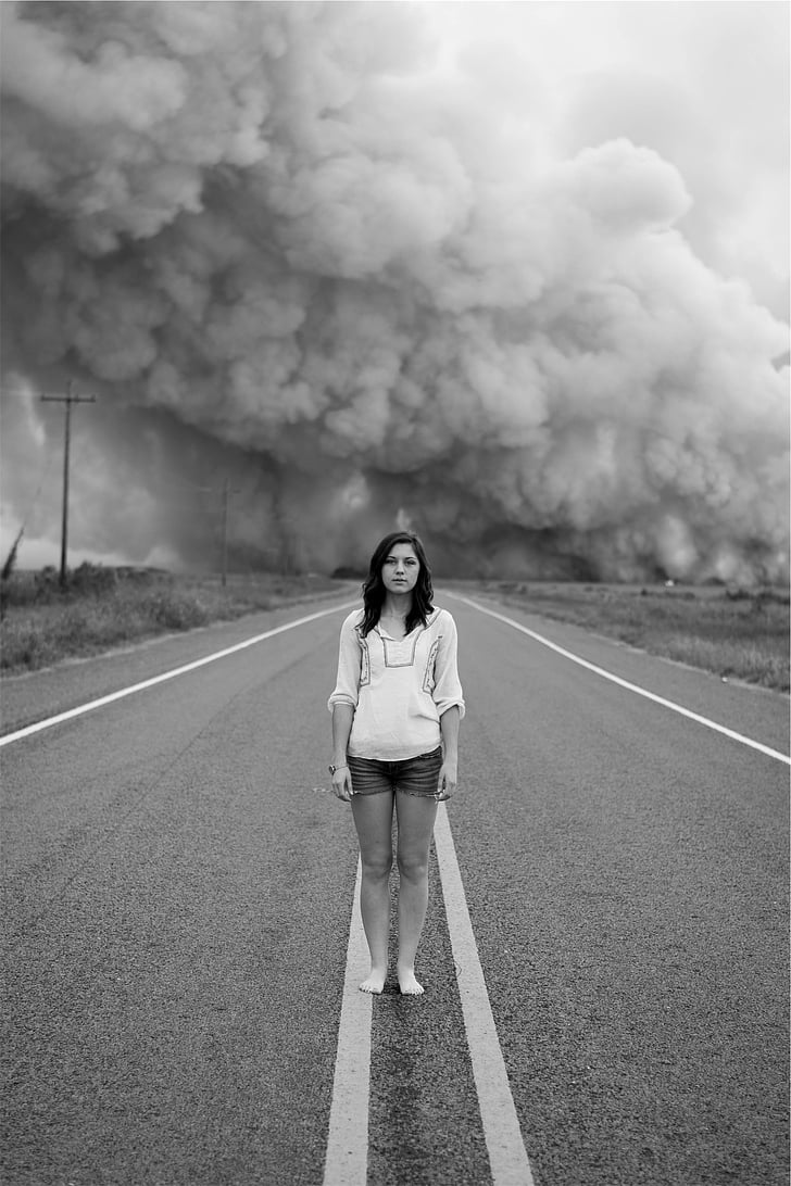 woman, standing, road, smoke, distance, young, girl