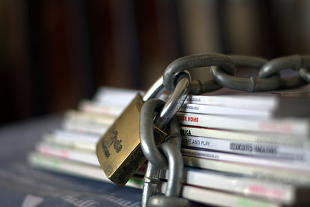 chained magazines, paper, safe, padlock, security, lock