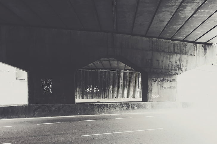 overpass, road, pavement, graffiti, concrete, black and white
