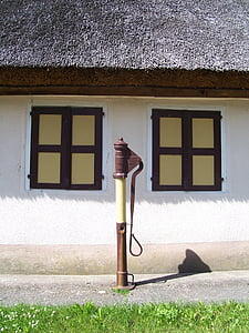 pivoting pump, pump, farmhouse, village, thatched roof, window, home