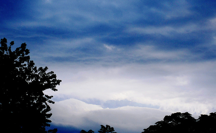 clouds, waves, stormy, moody, blues and white, light, trees