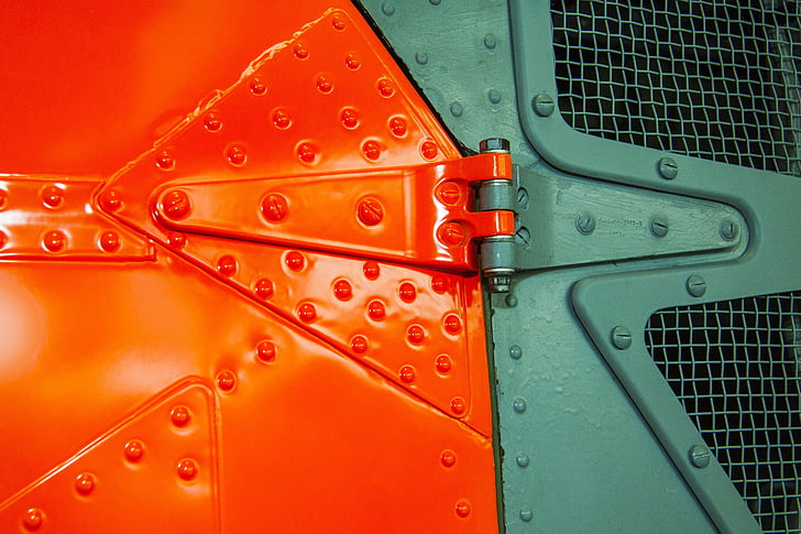 signal colour, helicopter door, rivet, screw, door hinge, lacquered, metal