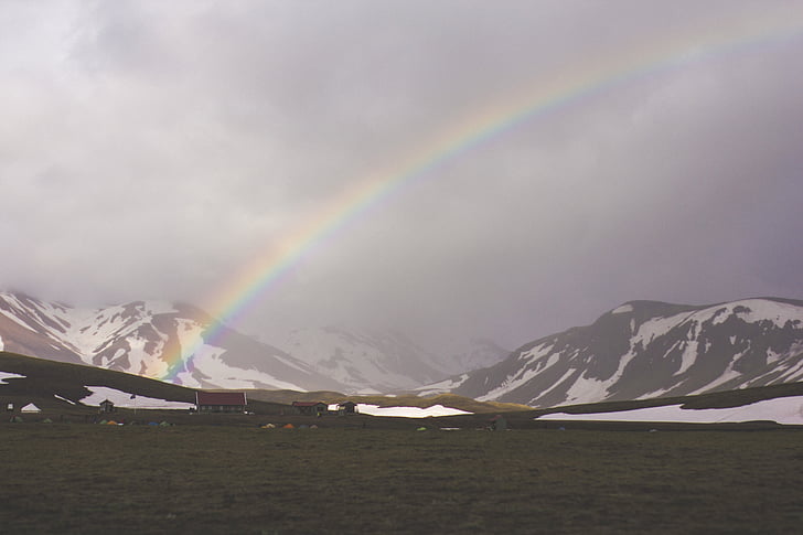 rainbow, beside, mountain, field, snow, sky, clouds