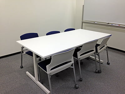 conference room, meeting space, chair, desk, office, black white board, company