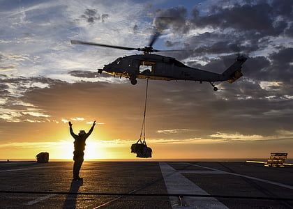 helicopter, sunrise, sea hawk, supplies, cargo, replenishment, silhouettes