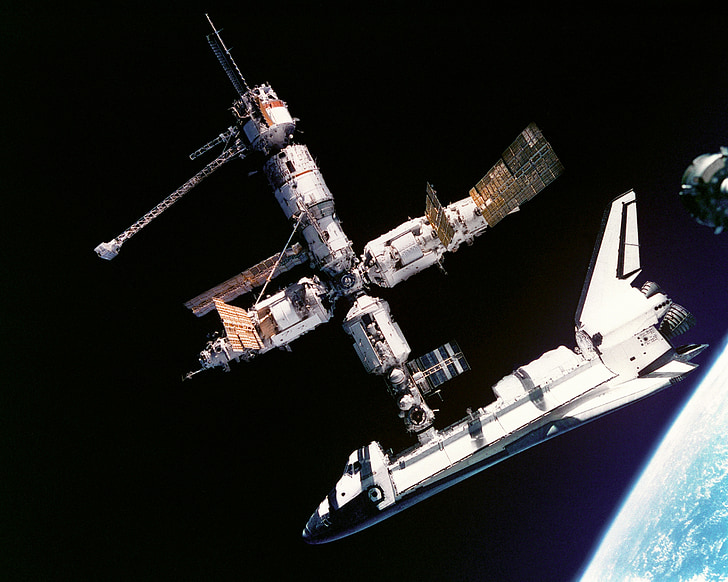 atlantis space shuttle, russia space station, mir, docked, connected, astronauts, cosmonauts