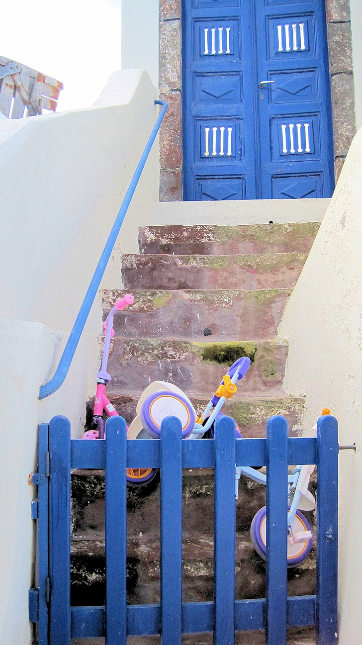 santorini, greece, child's bike, toys, travel, house steps
