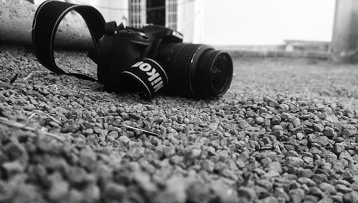 black-and-white, blur, camera, close-up, equipment, focus, ground