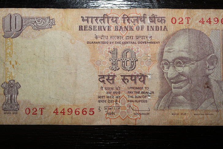Indiske rupi, rupees, penger, dollarseddel, valuta, regninger, papirpenger