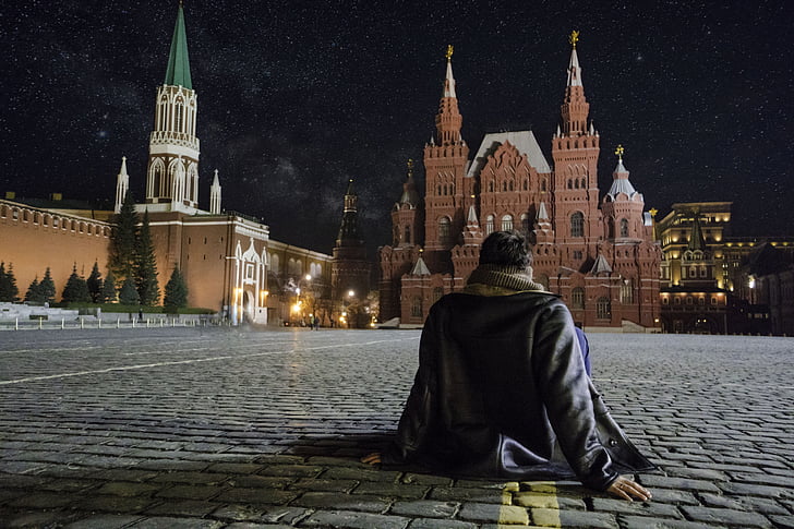 red square, men sitting, looking, casual, male, person, lifestyle