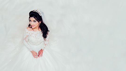 woman, wearing, white, long, sleeved, bridal, gown