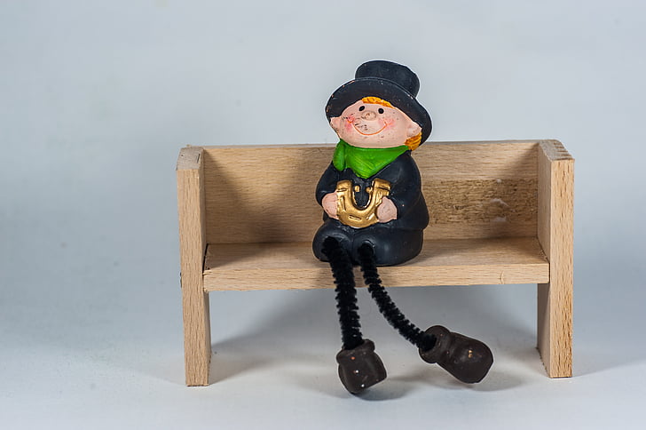 wooden bench, chimney sweep, horseshoe, hat, sitting, shoes, doll