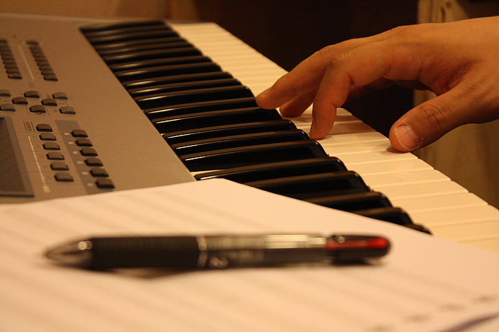 hand, piano, sheet music, ball point pen, o prophet