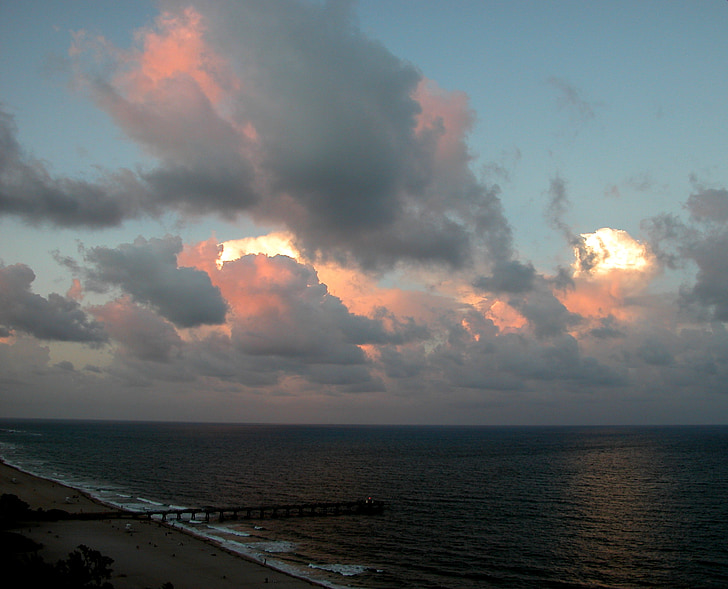 clouds, clouds over atlantic ocean, pier, shoreline, sunset