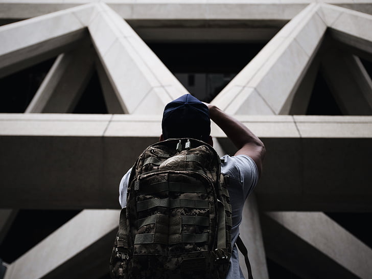 architecture, backpack, building, man, person
