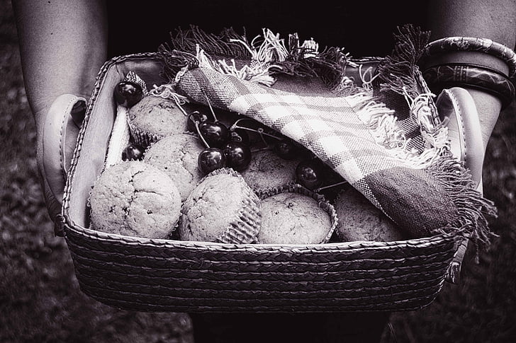 black and white, muffins basket, hands holding food basket, muffins, dessert, outdoor, cherry