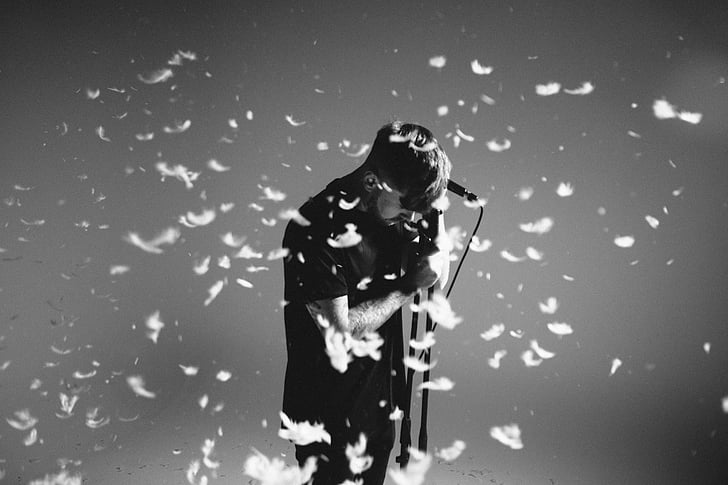 action, adult, confetti, feathers, man, microphone, motion