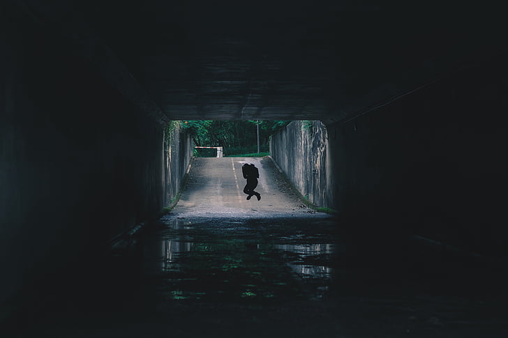 person, jumping, tunnel, road, dark, path, people