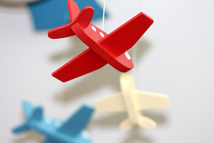 vliegtuig, speelgoed, rood, lichte achtergrond, symbool