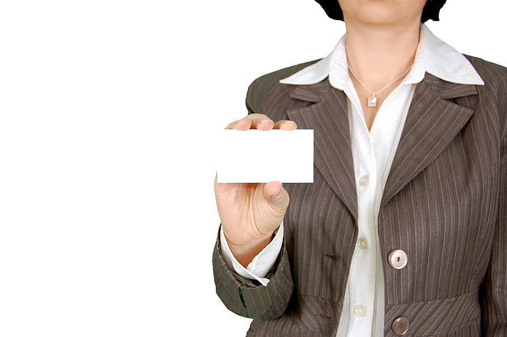 woman, brown, blazer, holding, white, card, business