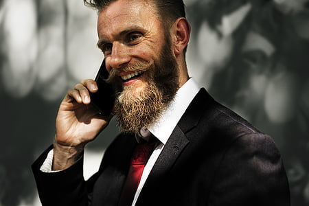beard, blur, cellphone, close-up, coffee, corporate, designer suit
