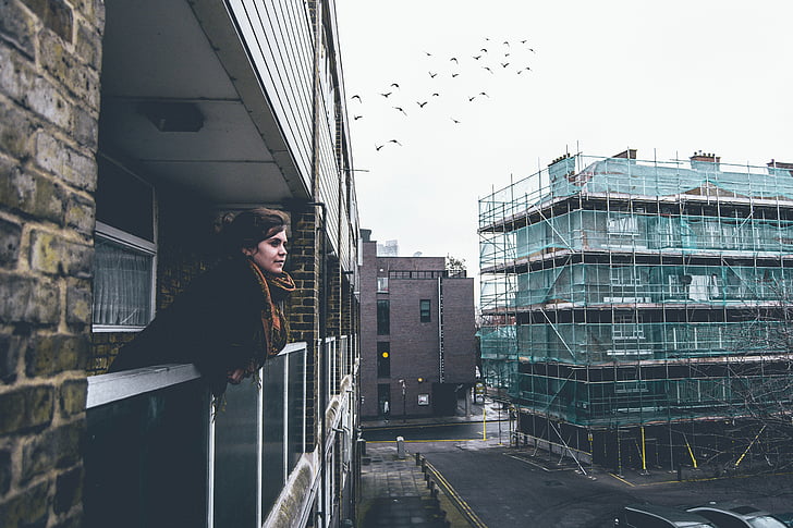 woman, balcony, city, architecture, building, urban, sky