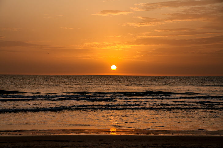 Plaża, zachód słońca, Słońce, pomarańczowe niebo, Wieczorem, morze, pejzaż