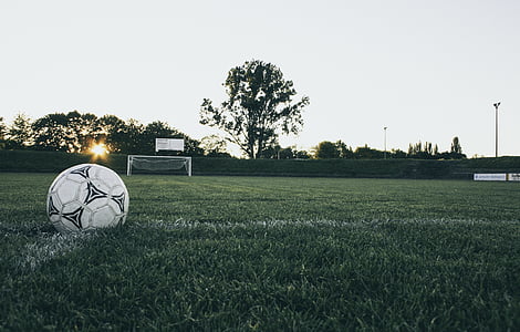 ball, field, grass, sky, soccer, sunrise, sunset