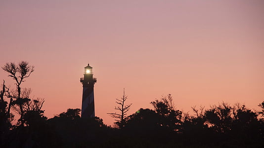lighthouse, sunset, evening, silhouettes, sea, light, trees