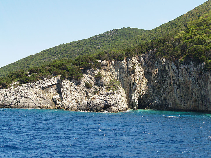 coast, blue sea, green rocks