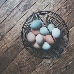 easter eggs, eggs, colored, basket, table, easter, holiday