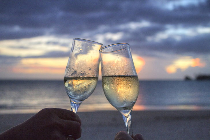 glasses, sparkling wine, cheers, sun set, evening, samoa, honeymoon