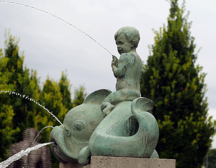 sculpture, child, fountain, fish, stone, tree, shrubs