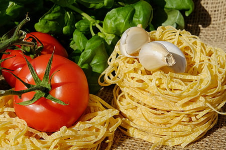 noodles, tagliatelle, pasta, raw, tomatoes, clove of garlic, basil